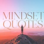 mindset quotes overlay a person on a mountain