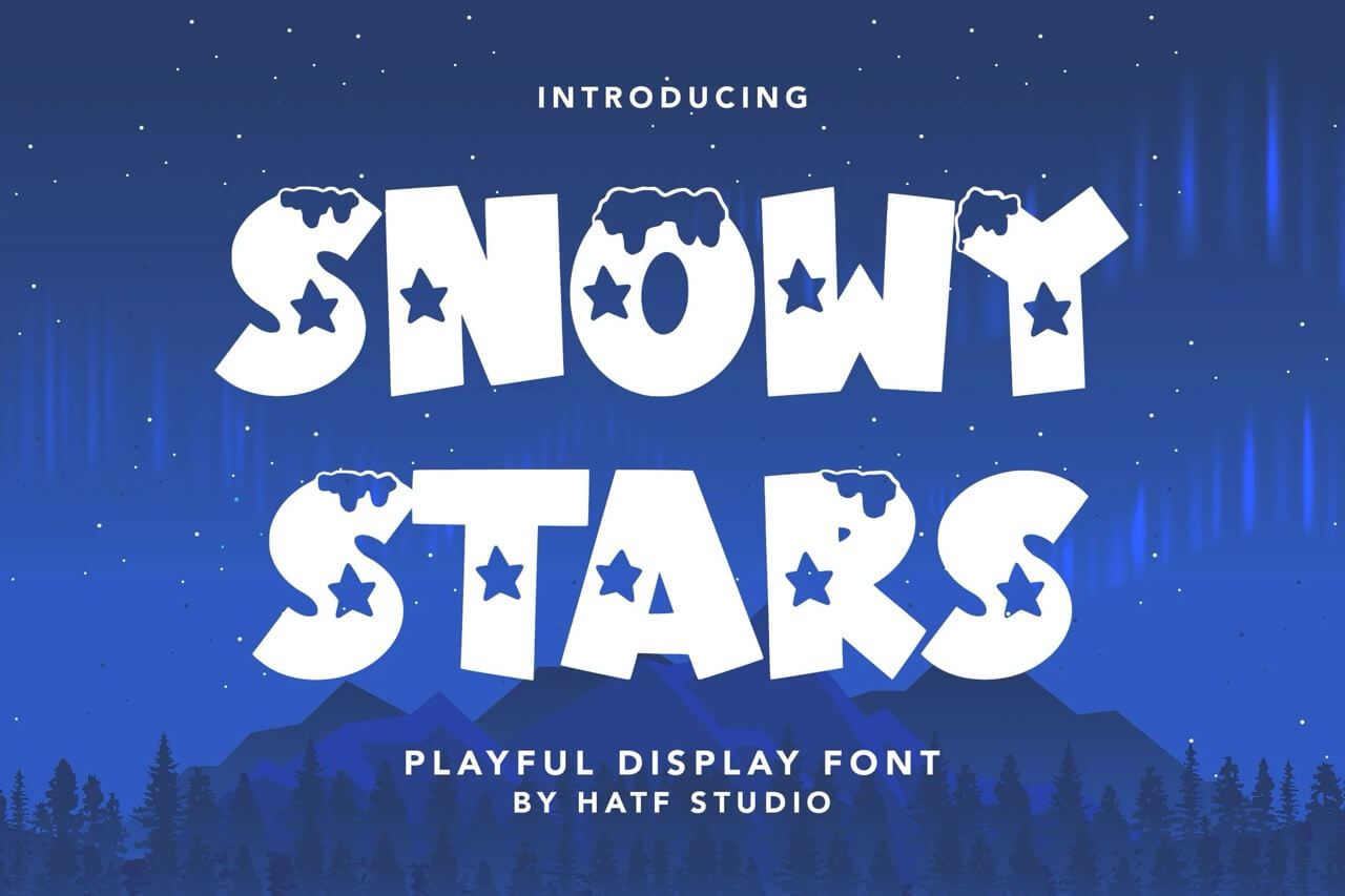 17 Fonts With Star Symbols That Actually Look Good 8 Playful display font named "Snowy Stars" by Hatf Studio, featuring snow-covered letters against a starlit night sky with mountain silhouettes.