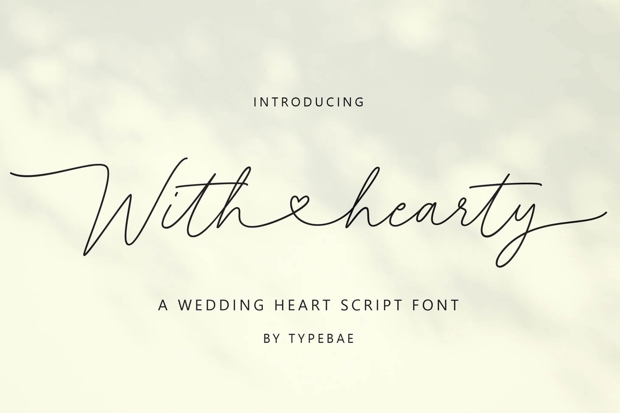 Elegant script font with a heart shape, designed for weddings, by Typebae. The background is soft and neutral, enhancing the font.