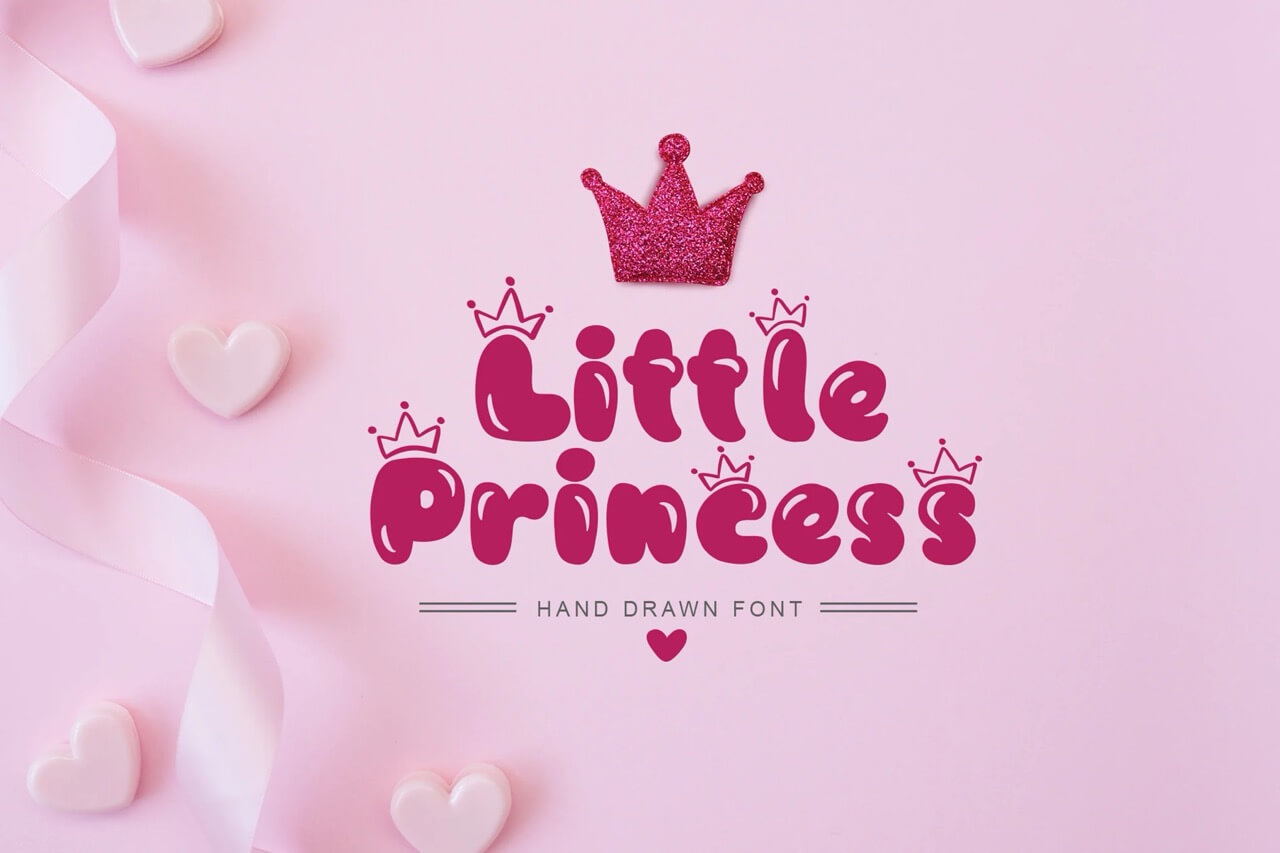 6 Crown Fonts: Royal Symbols 👑 All Creatives Should Know 4 Pink background with "Little Princess" text in a playful font. Glitter crown and heart shapes add decorative elements, creating a cute, whimsical design.