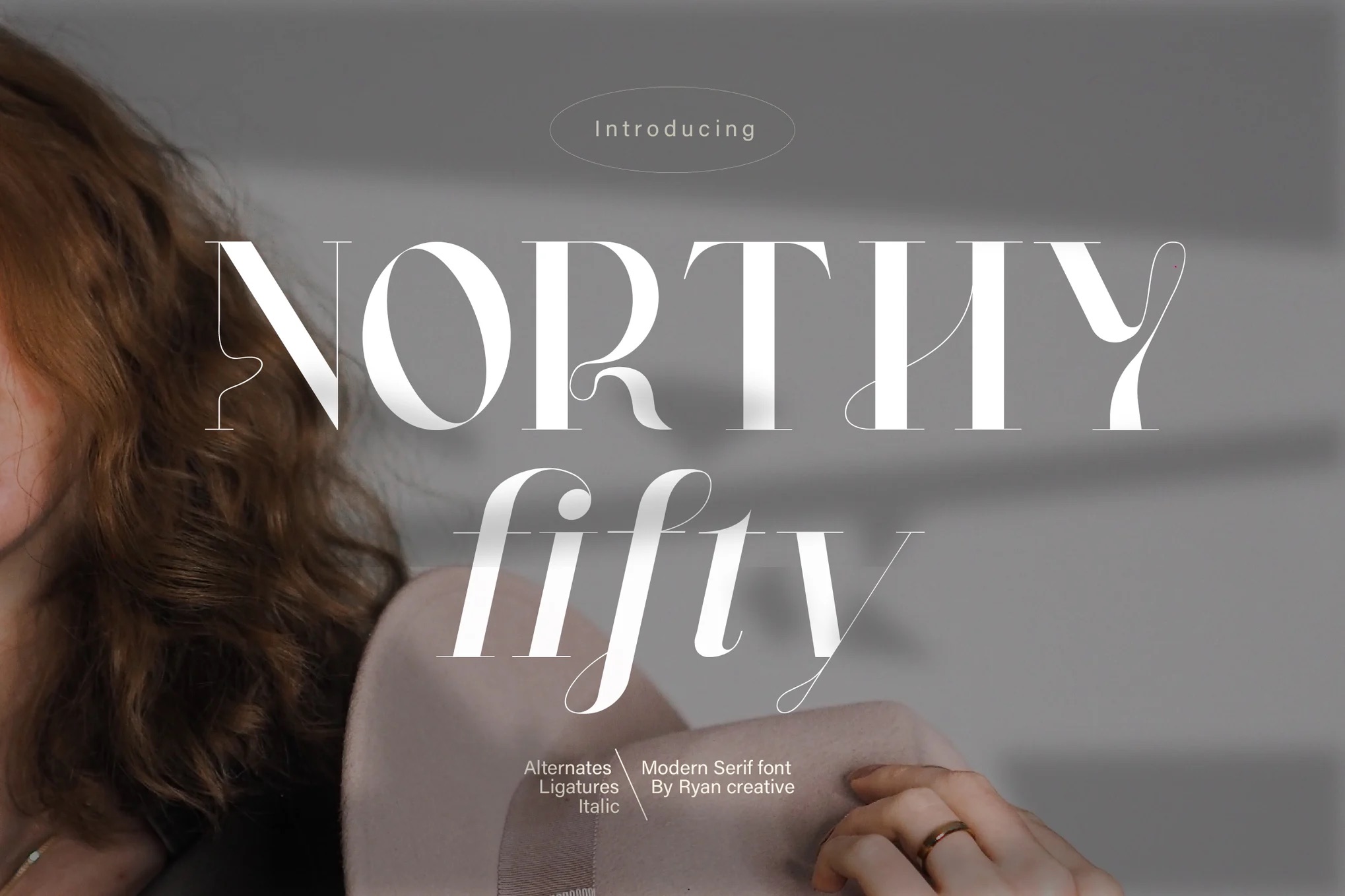 9 Best 1950s Fonts: Retro Designs with 50s Font Collection 9 A person with curly hair holds a hat. Overlaid text reads "Northy fifty," showcasing a modern serif font by Ryan Creative.